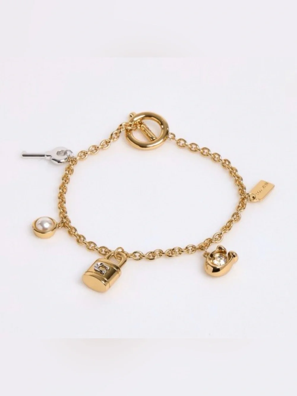 Coach Gold-Tone Charm Chain Bracelet with Pearl Accent